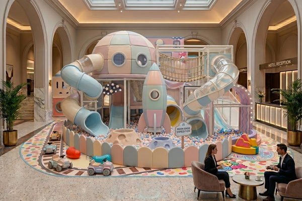 Toddler soft playhouse with slides, ball pit and sensory play equipment for a small play cafe