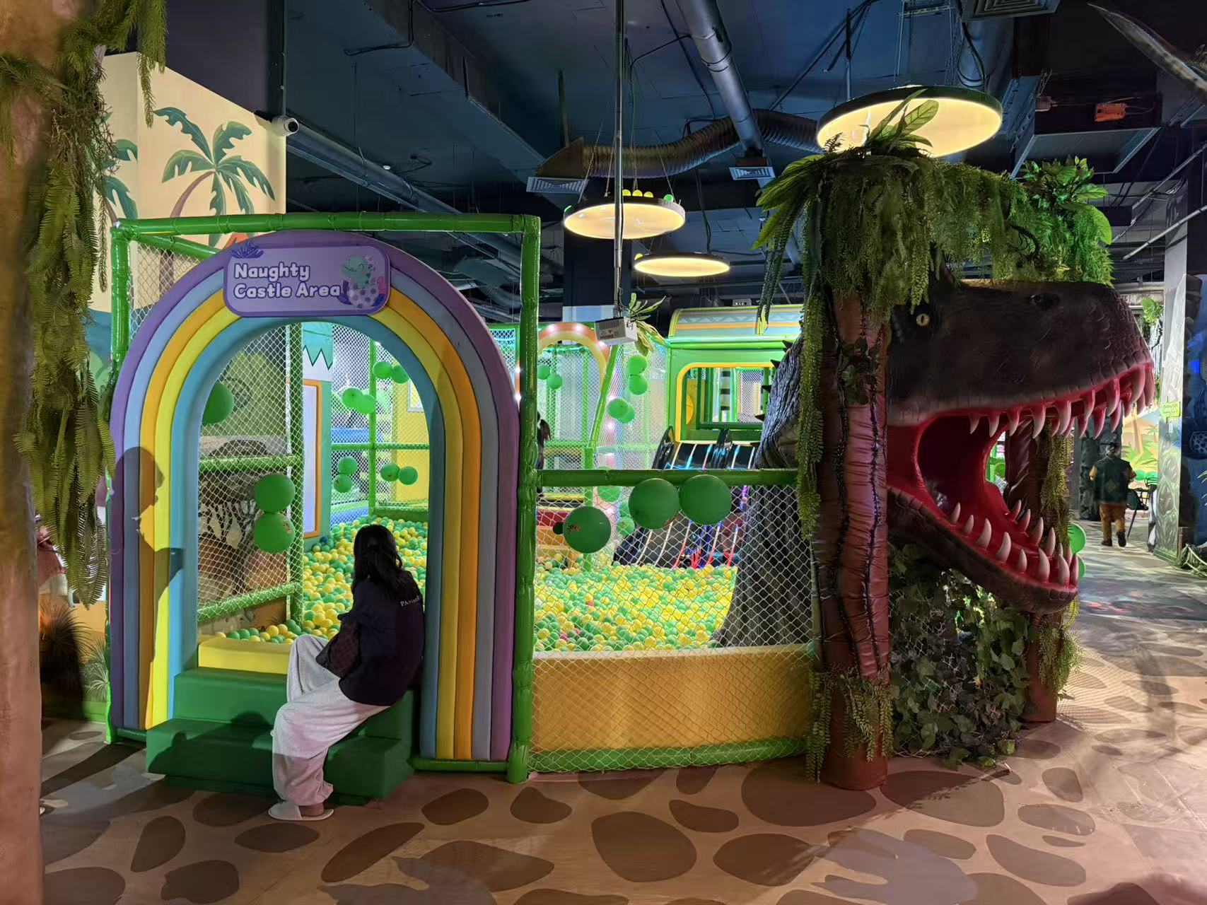 Custom dinosaur indoor playground equipment structure and activity mix